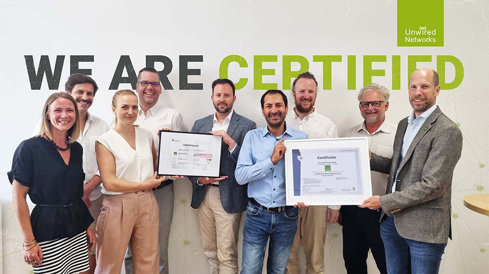 Unwired Networks Team receiving their ISO 9001 and ISO 27001 Certificates